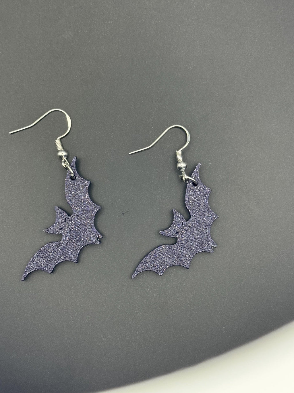 Sillouette Sparkly Deep Purple Bat Earrings