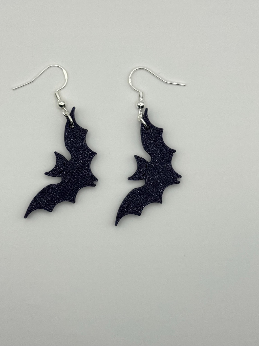 Sillouette Sparkly Deep Purple Bat Earrings
